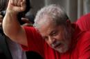 Former Brazilian President Lula waves to the crowd from his home in Sao Bernardo do Campo