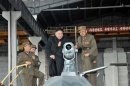 North Korean leader Kim Jong-un looks at the latest combat and technical equipments, made by unit 1501 of the Korean People's Army, during his visit to the unit