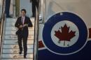 Canada's Prime Minister Justin Trudeau disembarks from his plane upon his arrival to attend the Asia-Pacific Economic Cooperation Summit in Manila on November 17, 2015