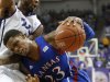 TCU forward Connell Crossland defends as Kansas guard Ben McLemore (23) drives to the basket during the first half of an NCAA college basketball game Wednesday, Feb. 6, 2013, in Fort Worth, Texas. (AP Photo/Sharon Ellman)