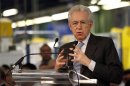Italy's Prime Minister Mario Monti gestures as he makes his speech during a visit to the Fiat car factory in the southern city of Melfi