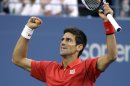 Novak Djokovic, of Serbia, reacts after a long point against Rafael Nadal, of Spain, during the men's singles final of the 2013 U.S. Open tennis tournament, Monday, Sept. 9, 2013, in New York. (AP Photo/David Goldman)