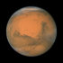 FILE - In this file image provided by NASA's Hubble Space Telescope a close-up of the red planet Mars is shown. Two scientists are proposing we send volunteers to Mars and leave them there. They say the mission would mark the beginning of long-term human colonization of Mars, with numerous follow-up trips. The colleagues contend one-way missions could happen a lot quicker and cheaper, and it is essential to begin colonizing another planet as a hedge against a catastrophe that makes Earth uninhabitable. (AP Photo/NASA, File)