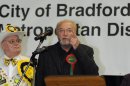 George Galloway, a member of the minority Respect Party, speaks on stage after winning the Bradford West seat, in Bradford, Friday March 30, 2012. Galloway said the result reflected public anger at sharp spending cuts and the Afghanistan war. (AP Photo/PA, Anna Gowthorpe) UNITED KINGDOM OUT NO SALES NO ARCHIVE