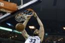 FILE -- In this May 11, 2015, file photo, Memphis Grizzlies center Marc Gasol (33) dunks the ball against the Golden State Warriors in Game 4 of a second-round NBA basketball Western Conference playoff series in Memphis, Tenn. The Grizzlies have made it very clear they want to keep All-Star center Gasol on their roster. But Gasol has made it very clear he will look at his options this summer as he prepares to hit free agency. (AP Photo/Mark Humphrey, File)