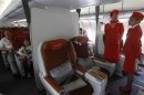 People sit onboard an Aeroflot Airbus A330 heading to the Cuban capital Havana at Moscow's Sheremetyevo airport