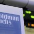 File photo of a Goldman Sachs sign is seen on at the company's post on the floor of the New York Stock Exchange