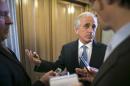Corker talks to reporters after the weekly Republican caucus luncheon at the U.S. Capitol in Washington
