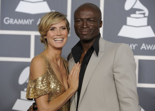 FILE - In this Feb. 13, 2011 file photo, Heidi Klum, left, and Seal arrive at the 53rd annual Grammy Awards in Los Angeles. In a statement Sunday, Jan. 22, 2012, the power-couple announced their separation. They say after "much soul searching" they've decided to separate, and blame the breakup on "growing apart." They married in 2005. (AP Photo/Chris Pizzello, File)