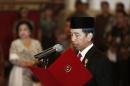 Indonesia's President Joko Widodo swears in Basuki Tjahaja Purnama as Jakarta governor at the Presidential palace in Jakarta