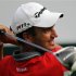 Molinari of Italy watches his shot on the first hole during the BMW Masters 2012 golf tournament at Lake Malaren Golf Club in Shanghai