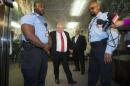 Toronto Mayor Rob Ford walks to respond to the Toronto police investigation in Toronto