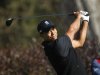 Tiger Woods of the U.S. hits from the 17th tee during the second round of the 2012 U.S. Open golf tournament on the Lake Course at the Olympic Club in San Francisco