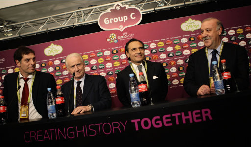 Coaches of Group C, Slaven Bilic from Croatia, Ireland's Giovanni Trapattoni, Italy's Cesare Prandelli and Spain's coach Vicente del Bosque, from left,, address the media after the Final Draw for the soccer Euro 2012 in Kiev, Ukraine, Friday, Dec 2, 2011. Group C is playing their matches in Gdansk and Poznan, Poland. (AP Photo/Kai Pfaffenbach, pool)