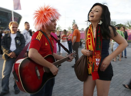 Spain and Portugal soccer fans arrive for Euro 2012 semi-final soccer match between Portugal and Spain at the Donbass Arena in Donetsk