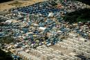 This picture taken on August 16, 2016, in Calais, shows an aerial view of the "jungle" camp where over 9000 migrants live according to different NGOs
