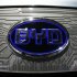 A BYD (Build Your Dreams) logo is seen on the front of an e6 electric vehicle during the press days for the North American International Auto show in Detroit