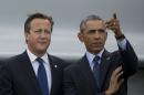 U.S. President Barack Obama, right, stands alongside British Prime Minister David Cameron