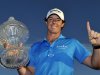 Rory McIlroy holds the trophy after winning the Honda Classic golf tournament in Palm Beach Gardens, Fla., Sunday, March 4, 2012. McIlroy became the top-ranked golfer in the world. (AP Photo/Rainier Ehrhardt)