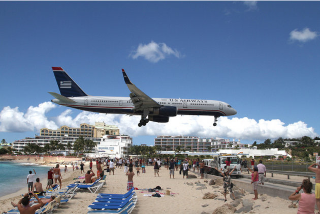 Because of Maho Beach's close proximity to Princess Juliana International Airport, airplanes must fly at a minimal altitude in order to touch down on the short runways. (Photo: Steve Lapensky/Flickr)