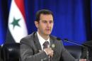 Handout of al-Assad speaking during his meeting with the leadership al-Baath party of Damascus countryside,in Damascus