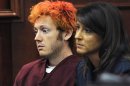 FILE - In this Monday, July 23, 2012 file photo, James Holmes, accused of killing 12 people in Friday's shooting rampage in an Aurora, Colo., movie theater, appears in Arapahoe County District Court with defense attorney Tamara Brady in Centennial, Colo. A court hearing Thursday, Aug. 30, 2012 will examine Holmes' relationship with a University of Colorado psychiatrist to whom he mailed a package containing a notebook that reportedly contains violent descriptions of an attack. His attorneys say Holmes is mentally ill and that he sought help from psychiatrist Lynne Fenton at the school, where he was a Ph.D. student, until shortly before the July 20 shooting. Prosecutors allege Holmes may have been angry at the failure of a once promising academic career. (AP Photo/Denver Post, RJ Sangosti, Pool, File)
