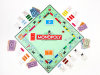 FILE - This product image provided by Hasbro, shows the board game Monopoly. The end is near for the shoe, wheelbarrow or iron in the classic Monopoly game as fans vote Tuesday, Feb. 5, 2013 in the final hours of a contest to determine which token to eliminate and which piece to replace it with. (AP Photo/Hasbro, File)