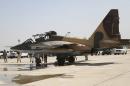 A Russian Sukhoi Su-25 fighter plane arrives at Iraq's al-Muthanna military airbase at Baghdad airport, in Baghdad