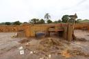 The debris of the municipal school of Bento Rodrigues district which was covered with mud after a dam, owned by Vale SA and BHP Billiton Ltd burst, are pictured in Mariana