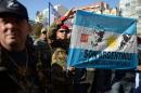 Veterans of the 1982 Falklands War between Great Britain and Argentina, take part in a protest outside the Argentinian Supreme Court in Buenos Aires on June 16, 2015