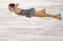Adelina Sotnikova of Russia competes in the women's free skate figure skating finals at the Iceberg Skating Palace during the 2014 Winter Olympics, Thursday, Feb. 20, 2014, in Sochi, Russia. (AP Photo/Vadim Ghirda)