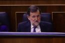Spanish Prime Minister Mariano Rajoy listens during a debate at the Spanish parliament in Madrid on April 6, 2016