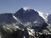 FILE - In this Tuesday, May 6, 2003 file photo, Mount Everest, at 8,850-meter (29,035-foot), the world's tallest mountain situated in the Nepal-Tibet border as seen from an airplane. Days after four people died amid a "traffic jam" of climbers scrambling to conquer Mount Everest, Nepal officials said a similar rush up the world's tallest peak will begin soon, and there's little they can do to control it. (AP Photo/Binod Joshi, File)