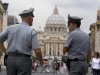 FILE - In this Tuesday, Sept. 21, 2010 file photo Italian financial Police officers talk, in front of St. Peter's square at the Vatican.    The Vatican is being besieged by near-daily leaks of confidential documents and tabloid-style reports about alleged money laundering at the Vatican bank, and in news reports Saturday Feb. 11, 2012, some conspiracy theorists highlight the upcoming crowning of 22 new cardinals, who will be partly responsible for electing the successor to the Pope himself. (AP Photo/Angelo Carconi, File)