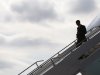 U.S. President Obama disembarks from Air Force One as he arrives for campaign events in Manchester, New Hampshire