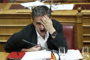 Greek Finance Minister Euclid Tsakalotos gestures during&nbsp;&hellip;