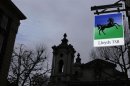 A Lloyds bank sign hangs outside a branch in London