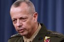 FILE - In this March 26, 2012 file photo, Marine Gen. John Allen speaks during a news conference at the Pentagon. President Barack Obama says he has accepted Allen's request to retire from military. (AP Photo/Haraz N. Ghanbari, File)