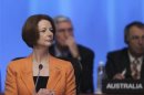 Australian Prime Minister Julia Gillard wait for the start of the first session of the G20 Summit in Los Cabos
