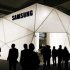 Visitors are seen in front of Samsung stand during the Mobile World Congress at Barcelona