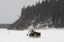Four-time Iditarod champion Martin Buser drives his dog team up the Yukon River after leaving the checkpoint in Anvik, Alaska, on Friday, March 8, 2013, during the Iditarod Trail Sled Dog Race. (AP Photo/Anchorage Daily News, Bill Roth)