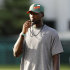 Miami quarterback Jacory Harris stands with a whistle in his mouth during football practice in Coral Gables, Fla., Thursday, Aug. 18, 2011. Harris did not practice in the morning session. The latest scandalous allegations in college football _ this time at the University of Miami _ have renewed talk by the NCAA of the need for "fundamental change" in athletics. (AP Photo/Lynne Sladky)