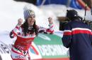 Austria's Anna Fenninger celebrates her first-place finish in the women's giant slalom competition at the alpine skiing world championships, Thursday, Feb. 12, 2015, in Beaver Creek, Colo. (AP Photo/Marco Trovati)