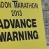 A road closure sign is seen placed along The Mall, the location for the London Marathon finish line, in central London