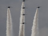 Six T-4 trainers, teaming up for the Blue Impulse, show off their skill during their aerobatic flight over the Japan Self-Defense Forces's Hyakuri Air Base, north of Tokyo,  Sunday, Oct. 16, 2011. (AP Photo/Shizuo Kambayashi)