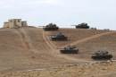 Turkish army tanks take up position on the Turkish-Syrian border near Suruc
