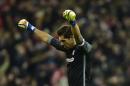 Athletic Bilbao's goalkeeper Gorka Iraizos, celebrates his side scoring their second goal, during the Spanish Copa del Rey, 16 round, first leg soccer match, between Athletic Bilbao and FC Barcelona, at San Mames stadium, in Bilbao, northern Spain, Thursday, Jan.5, 2017. (AP Photo/Alvaro Barrientos)