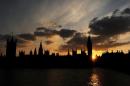 The sun sets behind Britain's Houses of Parliament in London, on April 15, 2010