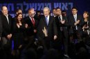 Israel's Prime Minister Netanyahu waves to supporters at the Likud party headquarters in Tel Aviv