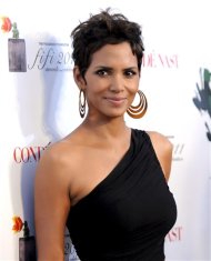 Actress Halle Berry is reported to be engaged to Olivier Martinez. In this picture, Actress Halle Berry attends The Fragrance Foundation's 2011 FiFi Awards at The Tent at Lincoln Center on Wednesday, May 25, 2011 in New York. (AP Photo/Evan Agostini)
